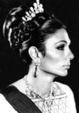 Farah Pahlavi (born Farah Diba, 14 October 1938, Tehran); Persian: فرح پهلوی, is the former Queen and Empress of Iran. She is the widow of Mohammad Reza Pahlavi, the Shah of Iran, and only Empress (Shahbanou) of modern Iran. She was Queen Consort of Iran from 1959 until 1967 and Empress Consort from 1967 until exile in 1979.<br/><br/>

Though the titles and distinctions of the Iranian Imperial Family were abolished within Iran by the Islamic government, she is still styled Empress or Shahbanou, out of courtesy, by the foreign media as well as by supporters of the monarchy. Some countries such as the United States of America, Denmark, Spain and Germany still address the former Empress as Her Imperial Majesty The Shahbanou of Iran in official documents, for example Royal wedding guest lists.