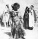 Algeria / Tunisia: Ouled Nail dancing girl with musicians, c. 1920